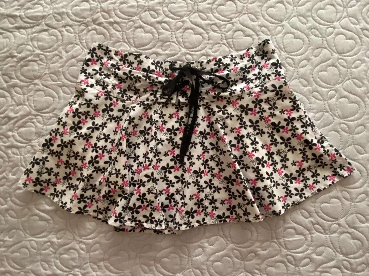 Minissaia evasé com estampa floral. Fishbone. Tamanho PP – photo 11